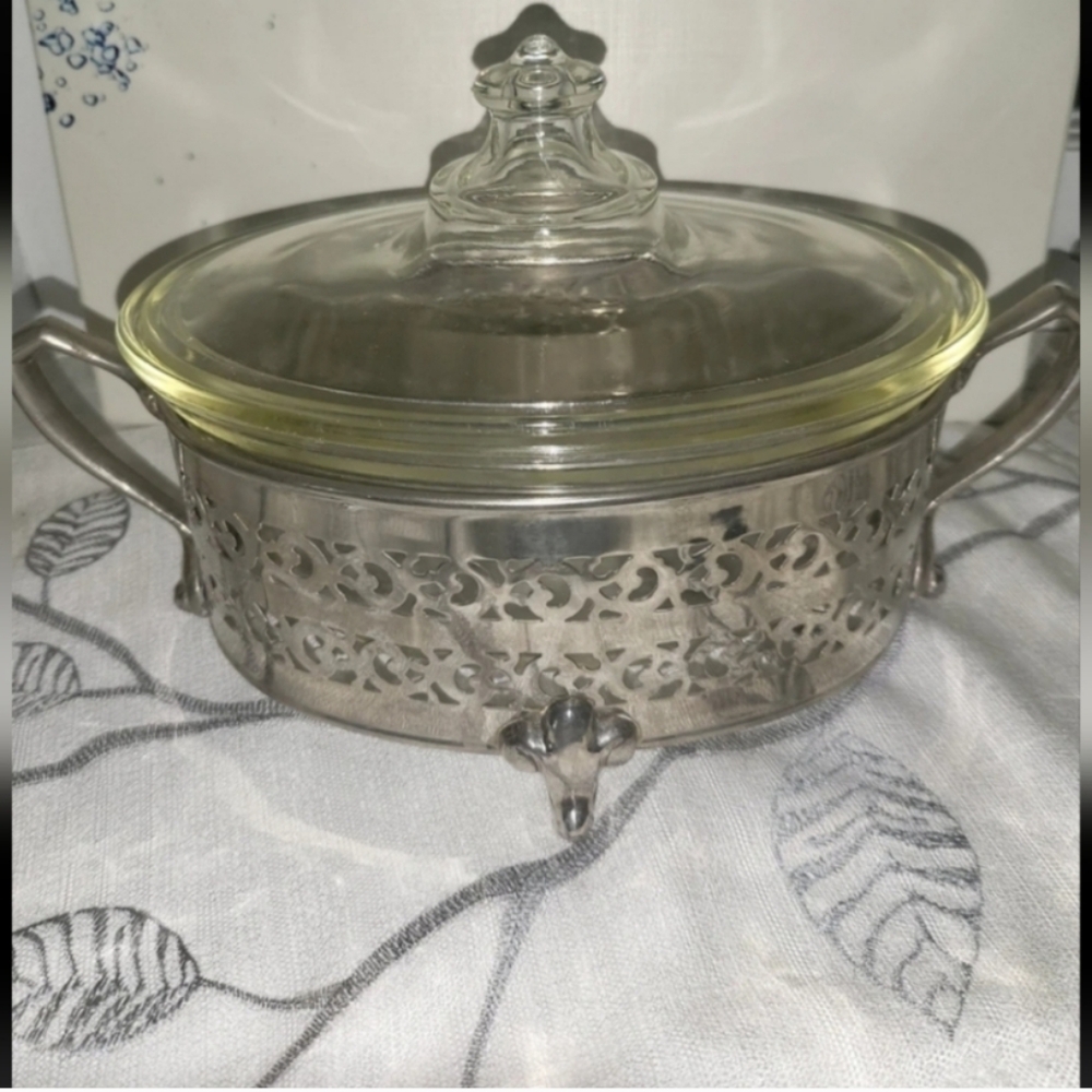 VTG Pyrex Glass Serving Piece With Lid And A Metal Holder.